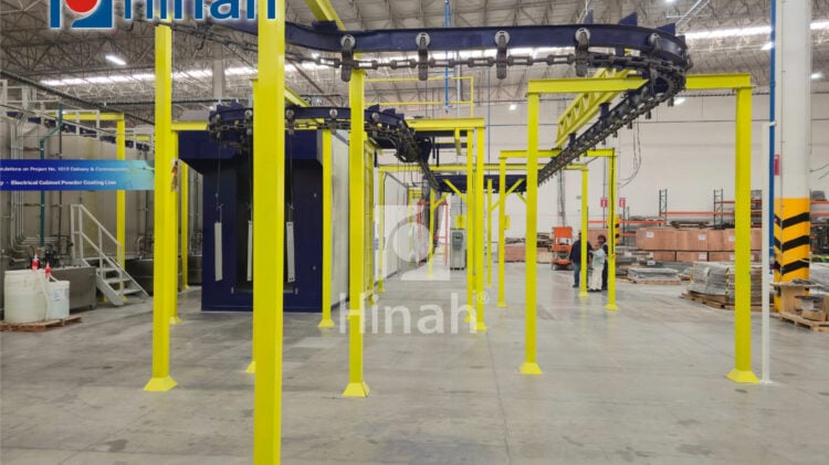 Powder coating line for cabinet frames (1) Overhead power and free conveyor used to hang welded cabinet frames